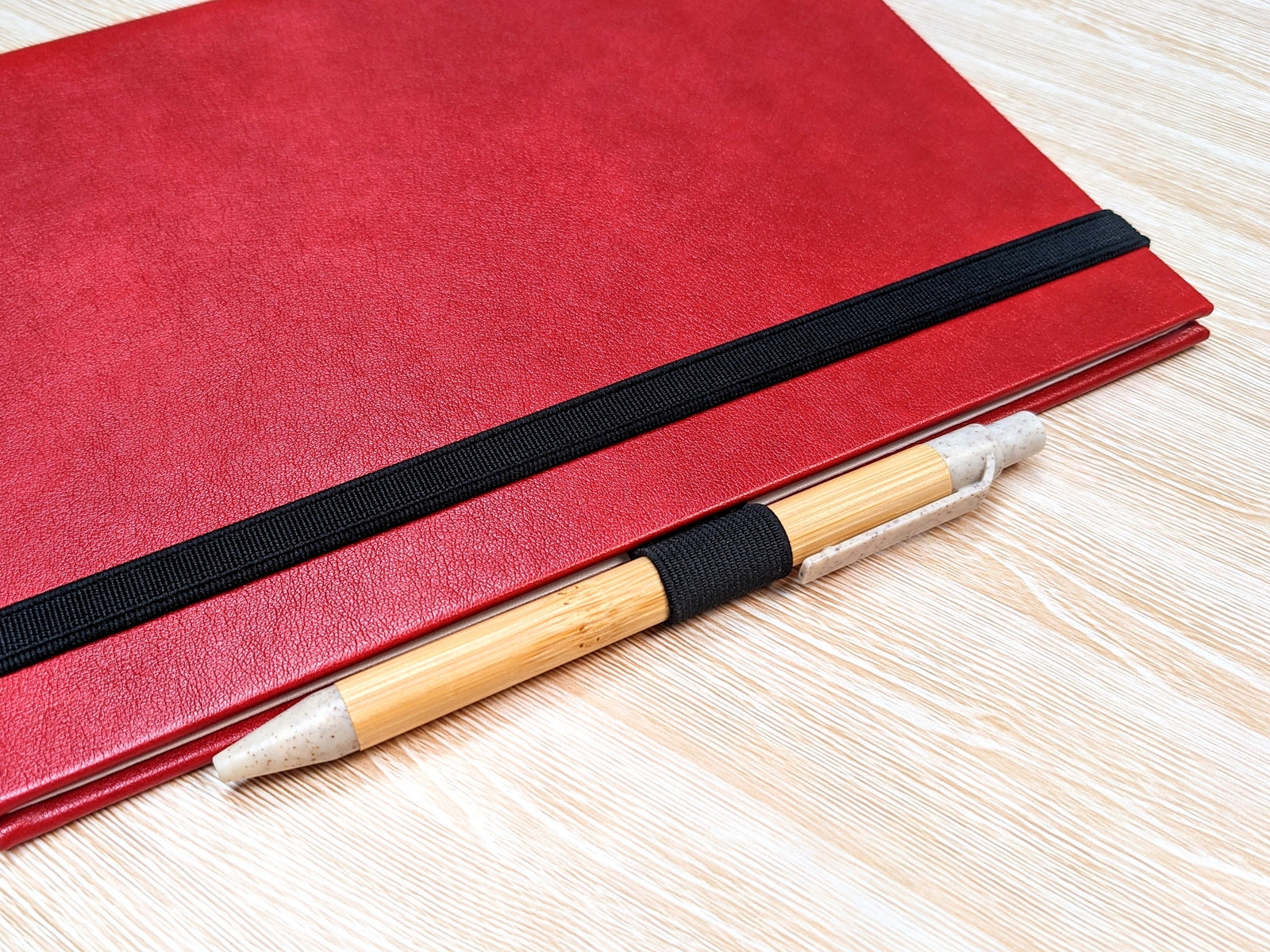 Keep your pen with your notebook with the Paper Saver Pen Loop