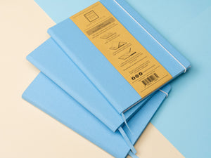 The Canvas Paper Saver Reusable Notebook in sky blue is made of 100% cotton and helps you reuse and upcycle paper easier in a more stylish way.