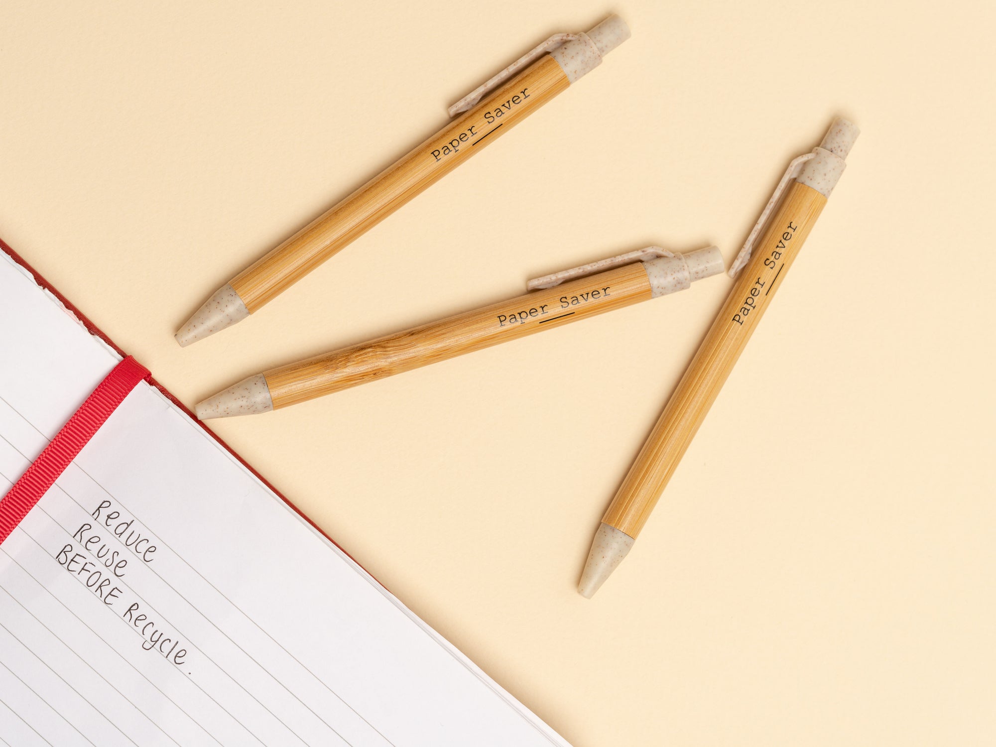 Write with a reusable eco pen made of the sustainable bamboo that you can refill again and again to stop throwing away single-use plastic disposable pens!