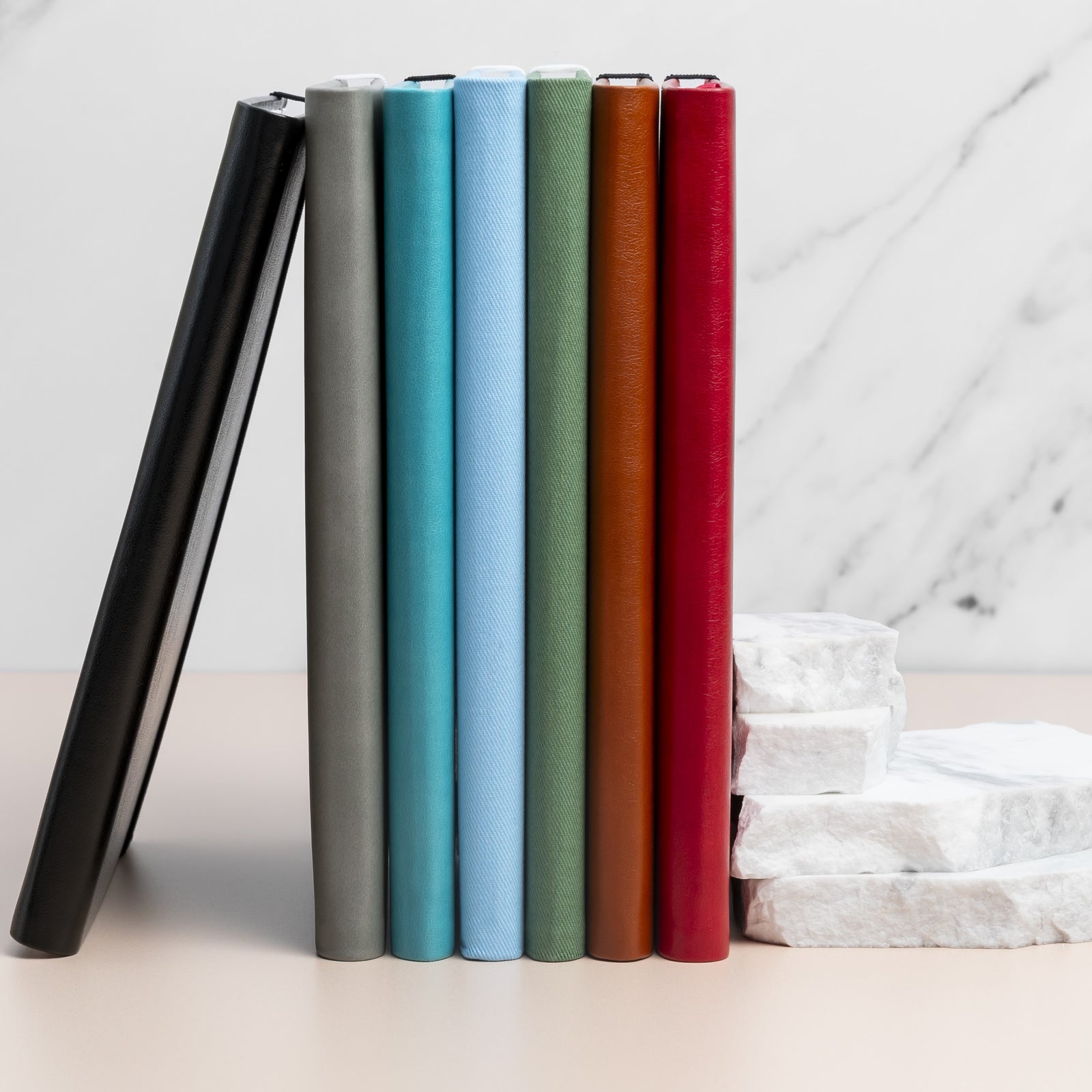 Refillable notebooks with stone paper are cost effective and have a smaller eco footprint than traditional wood-based paper notebooks