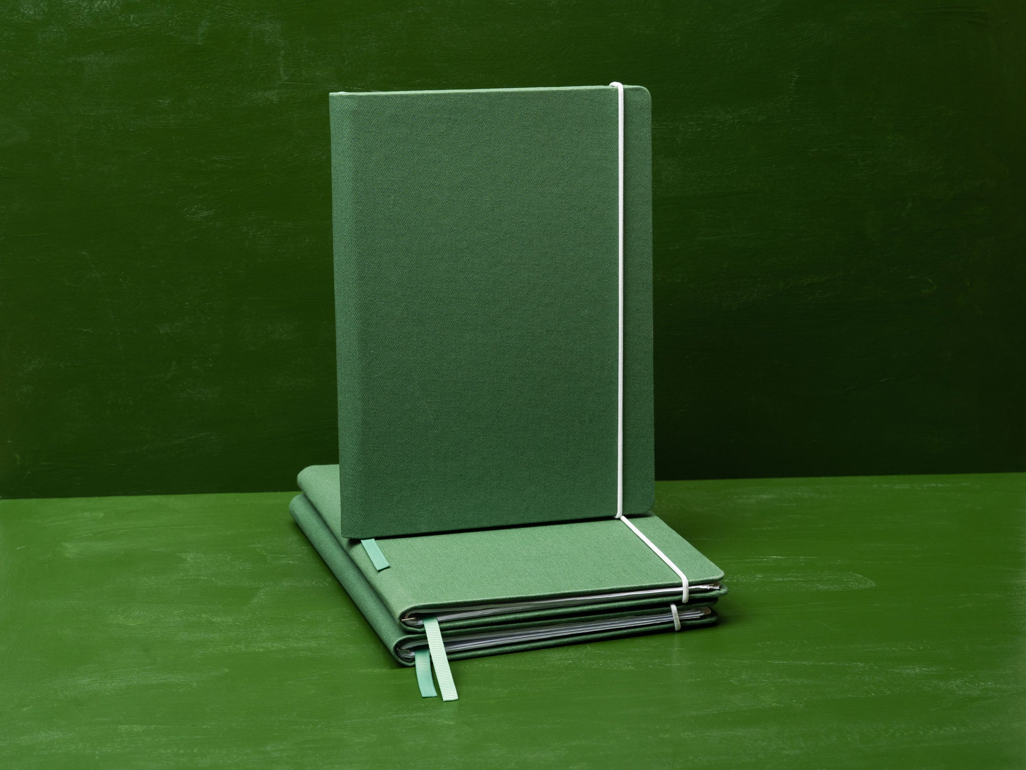 The Canvas Paper Saver Reusable Notebook in Thyme Green is made of 100% cotton