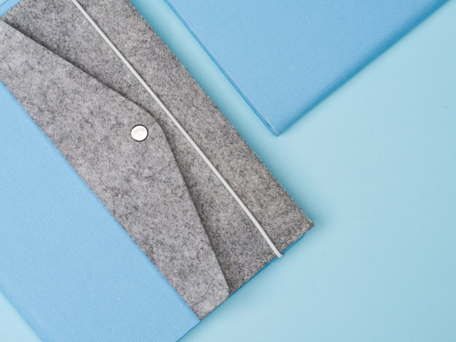 The Canvas Paper Saver Reusable Notebook in Sky Blue with the Paper Saver Organiser to get more organised and keep all your stationery and work essentials in one place with a pencil case, card and document holders.