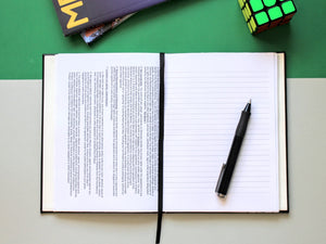 The Paper Saver is a reusable notebook that repurposes your paper as its pages so you can write your notes and ideas more sustainably, reducing paper waste and saving the environment.