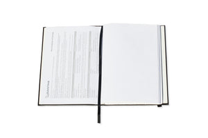 The Classic Paper Saver Reusable Notebook opened with its double sided vegan leather covers for extra durability and spill-resistance; spring steel binder designed to easily and conveniently insert and secure your used paper to write on the back blank sides, upcycling your paper and reducing your paper waste - a more sustainable way to write and live the eco friendly way.