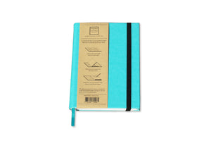 The Paper Saver Reusable Eco Notebook in teal repurposes your paper as its pages so you can write your notes and ideas more sustainably, reducing paper waste and saving the environment.