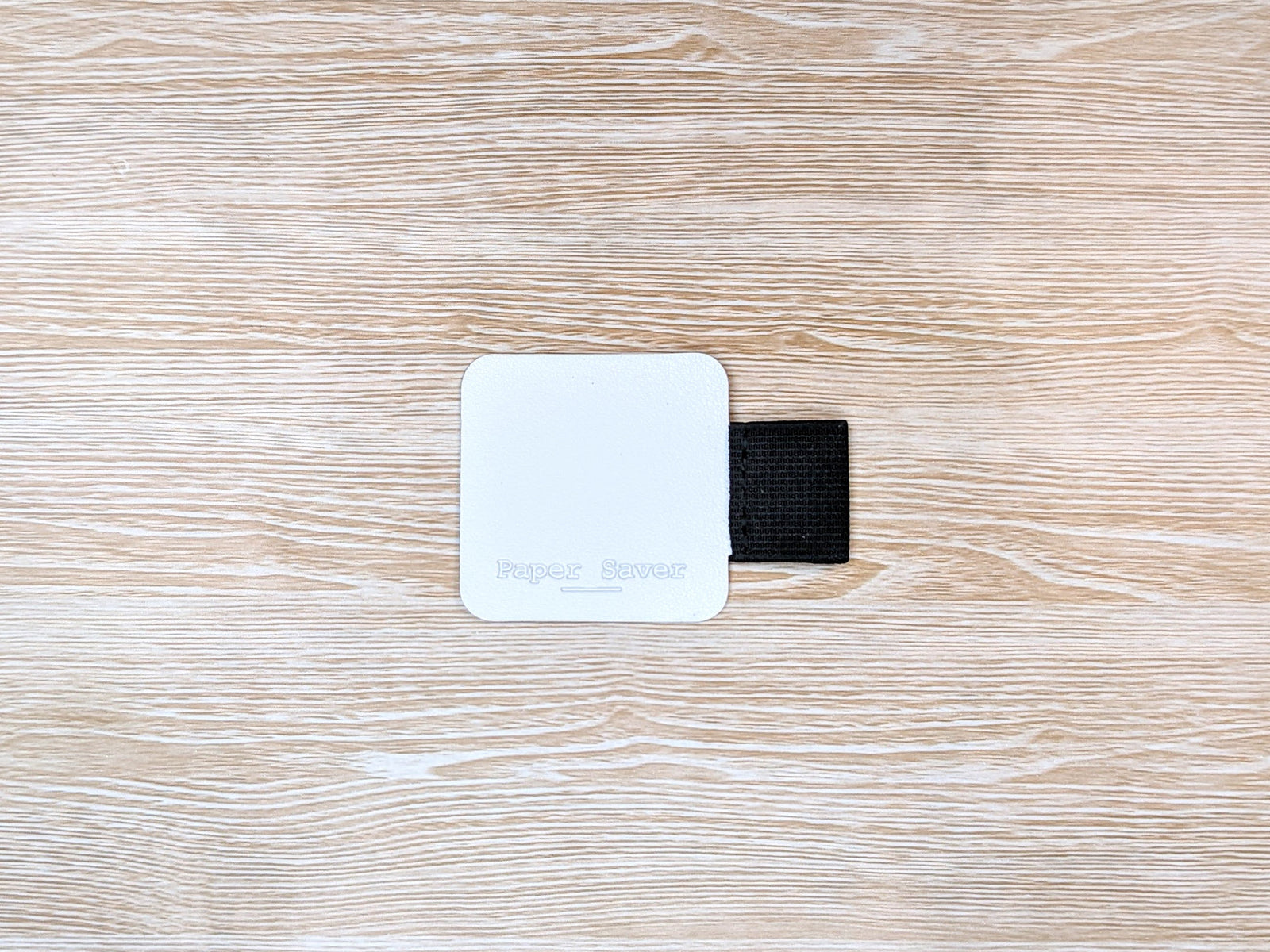 The Paper Saver Pen Loop comes with self-adhesive back to secure onto the inside back cover of the Paper Saver Notebook