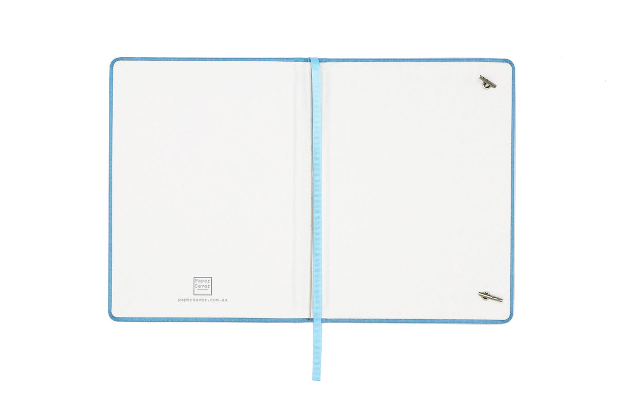 To use the Paper Saver Reusable Notebook, first open it to find the spring steel binder inside for the insertion of your used paper to be upcycled as pages of your eco friendly reusable notebook.