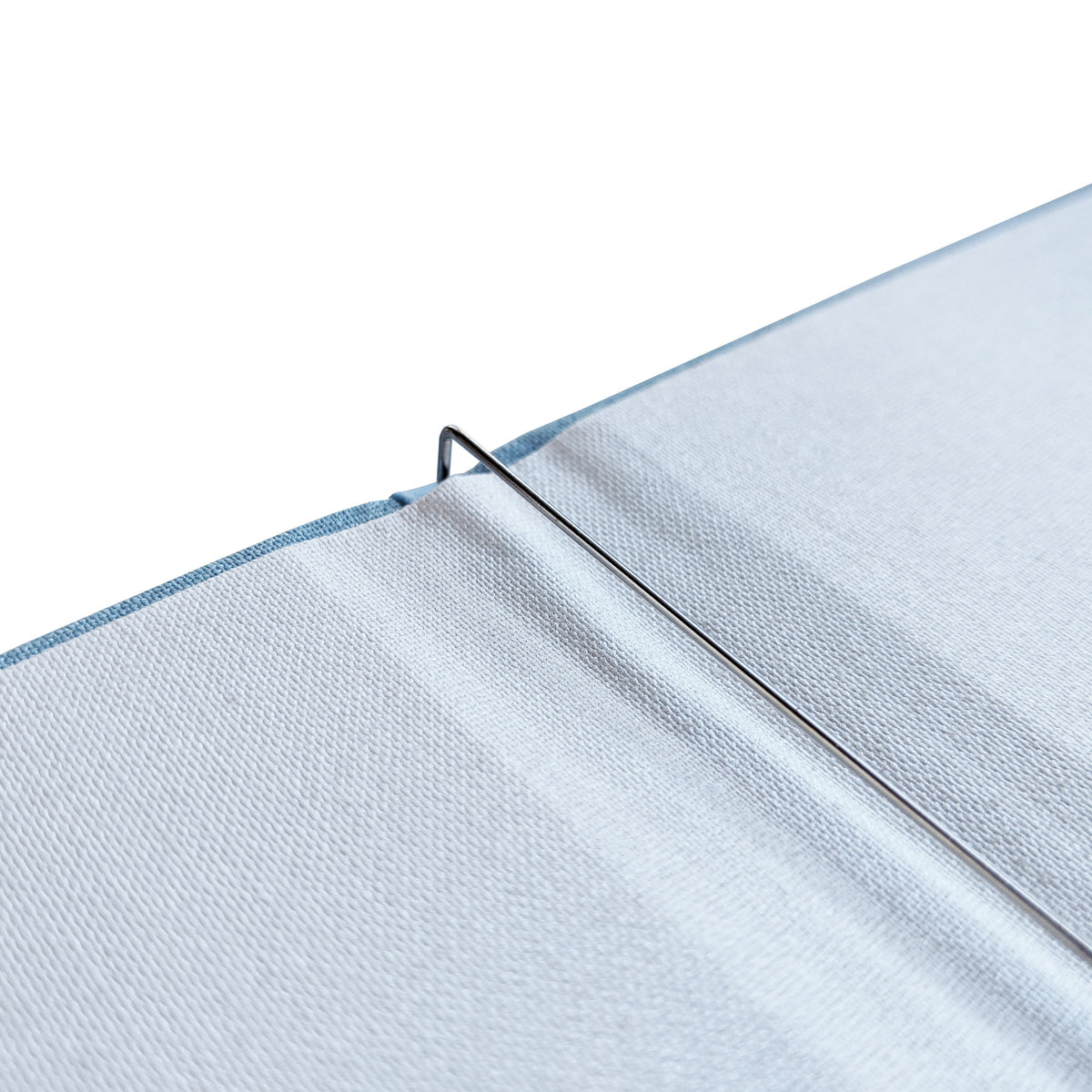 The Paper Saver Reusable Notebook encases a spring steel binder inside to easily and conveniently insert your recycled paper through, then also securing your paper as you upcycle and reuse as pages to write your notes and ideas sustainably, reducing paper waste.